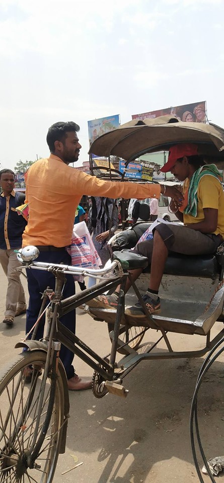 Distributing Sunstroke Medicine, water Bottles, Towels, and Health Tonic to all Traffic Police, Rickshaw Drivers, Automobiles, and common people.