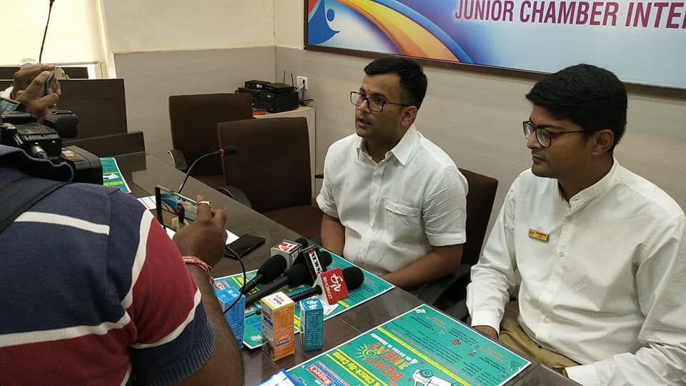 Distributing Sunstroke Medicine, water Bottles, Towels, and Health Tonic to all Traffic Police, Rickshaw Drivers, Automobiles, and common people.