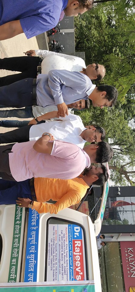 Distributing Sunstroke Medicine, water Bottles, Towels, and Health Tonic to all Traffic Police, Rickshaw Drivers, Automobiles, and common people.