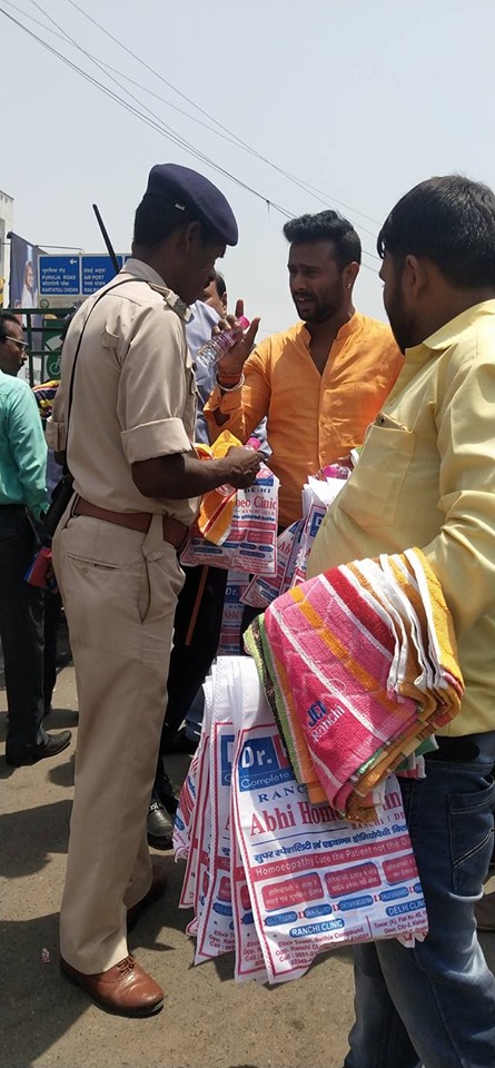 Distributing Sunstroke Medicine, water Bottles, Towels, and Health Tonic to all Traffic Police, Rickshaw Drivers, Automobiles, and common people.